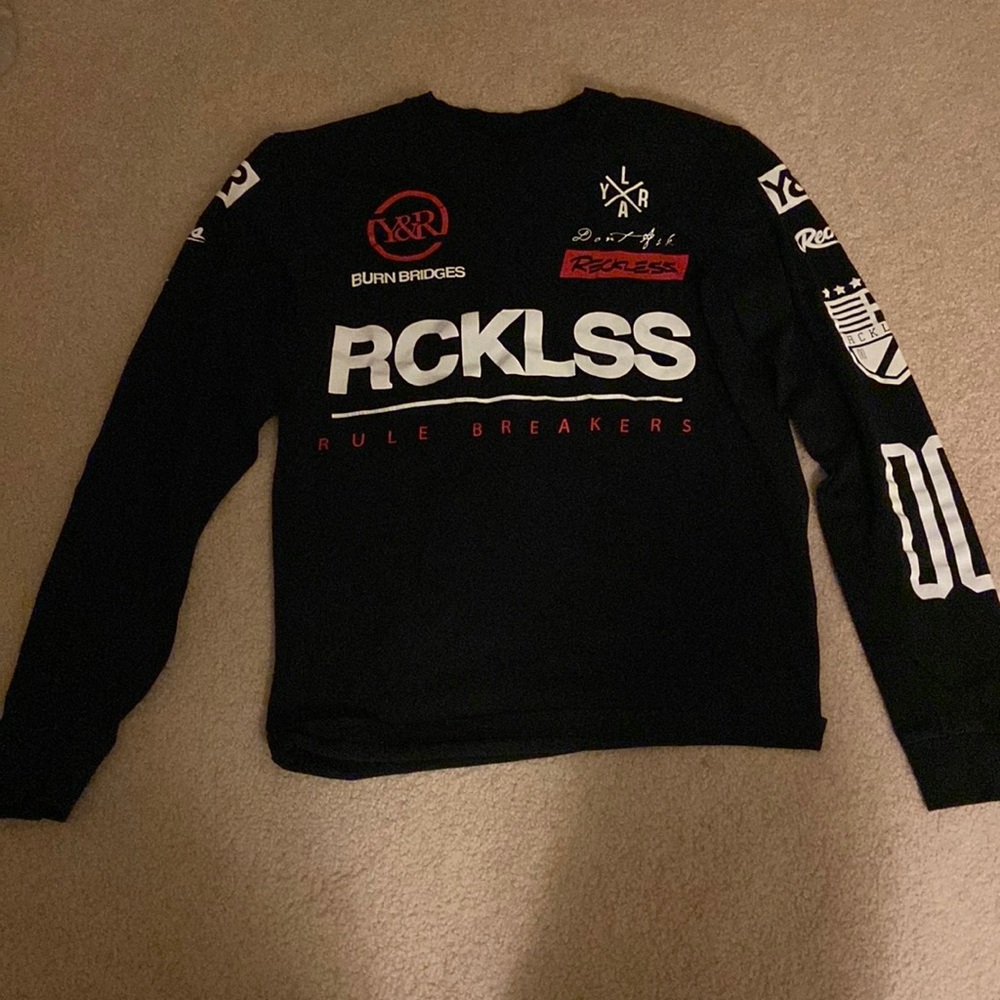 YR Reckless black long sleeve t-shirt covered in logos.